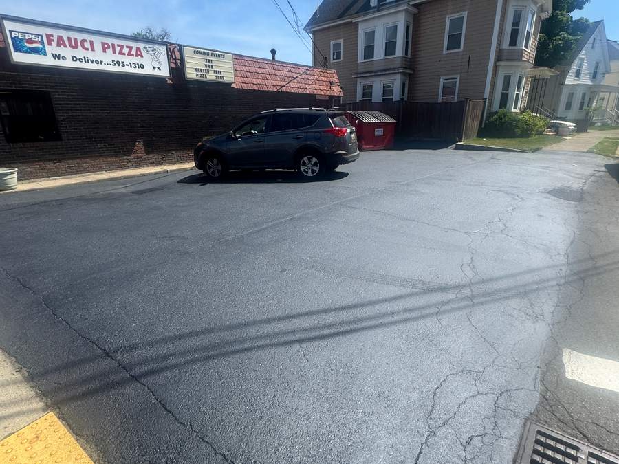 Commercial parking lot after paving maintenance and line striping
