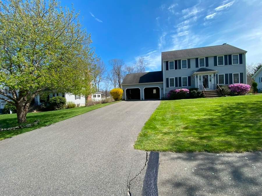 Driveway before asphalt sealcoating by Boston Alliance Sealcoating