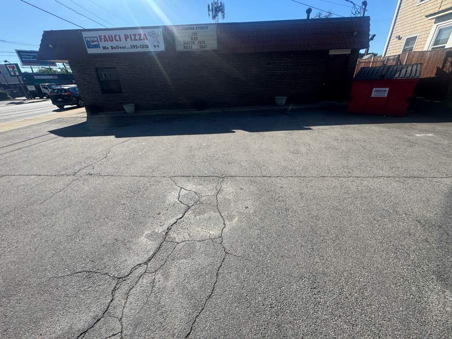 Commercial parking lot before paving maintenance and line striping